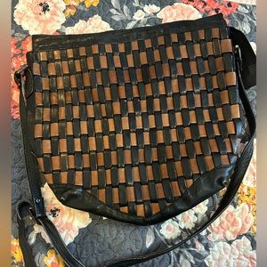 Woven tan and black leather vintage bag.